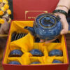 bo-am-chen-in-logo-mau-xanh-duong-men-hoa-bien-hoa-tiet-hoa-no-trong-long-chen-3