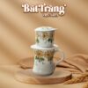 bo-phin-cafe-su-bat-trang-dang-cao-ve-tay-hoa-tiet-hoa-mau-cam-dung-tich-300ml