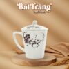 ly-su-bat-trang-qua-tang-in-logo-hoa-tiet-ve-tay-hoa-cham-den-co-nap-dung-tich-350ml