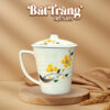 ly-su-bat-trang-qua-tang-in-logo-hoa-tiet-ve-tay-hoa-mai-vang-co-nap-dung-tich-350ml