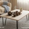 The elegant brown-gold ceramic tea set displaye...