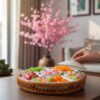 Một khay mứt sứ trắng cao cấp trên bàn trà gỗ t...