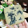 Bộ ấm chén men rạn cổ dáng vuông quai đồng vẽ Trúc Lâm Thất Hiền BT-AC66
