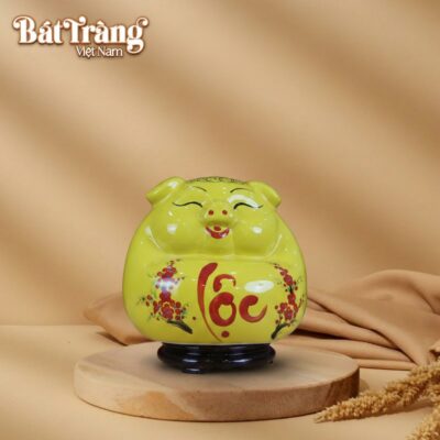 Ống tiết kiệm heo phệ mắt hip ngồi màu vàng chữ lộc BT-HĐ11 - Ảnh đại diện